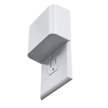 This image shows a close-up of the Permaplug Charger Lock securely attached to a standard wall outlet. The charger lock cover is sleek and minimalistic, wrapping around the top portion of the plug, providing a secure and tamper-resistant charging solution. The angle emphasizes the product's modern design and its functional integration with the outlet.